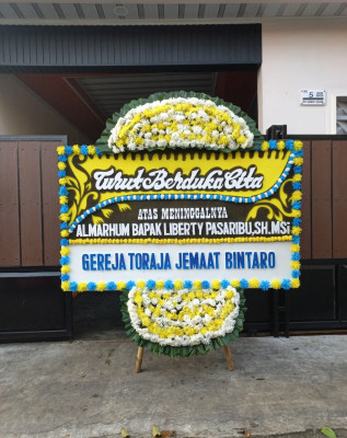 Papan Bunga Duka di Ambit